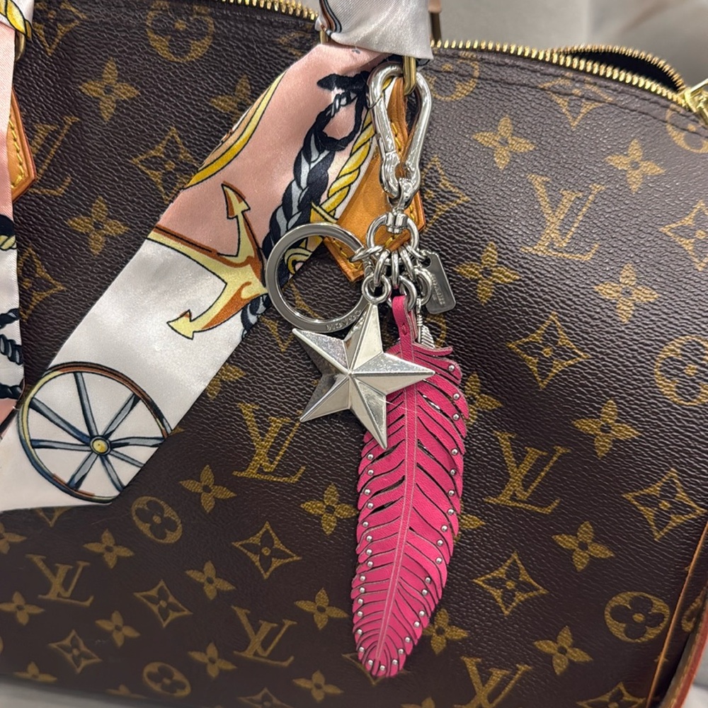 Coach purse charm fob dahlia pink feather